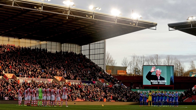 Stoke and Chelsea players line up for a minutes applause in memory of Nelson Mandela
