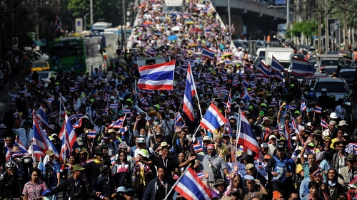 Thailand's National Security Council said only 6,500 people gathered at the busy Asoke intersection in central Bangkok