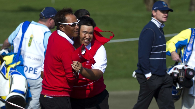 Thongchai Jaidee and Kiradech Aphibarnrat celebrate their win over Stephen Gallacher and Paul Lawrie