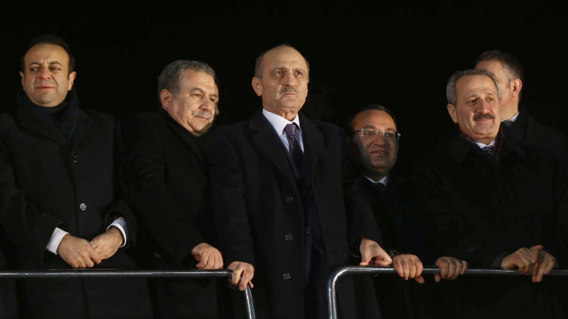 Erdogan Bayraktar (centre) urged the prime minister to stand down