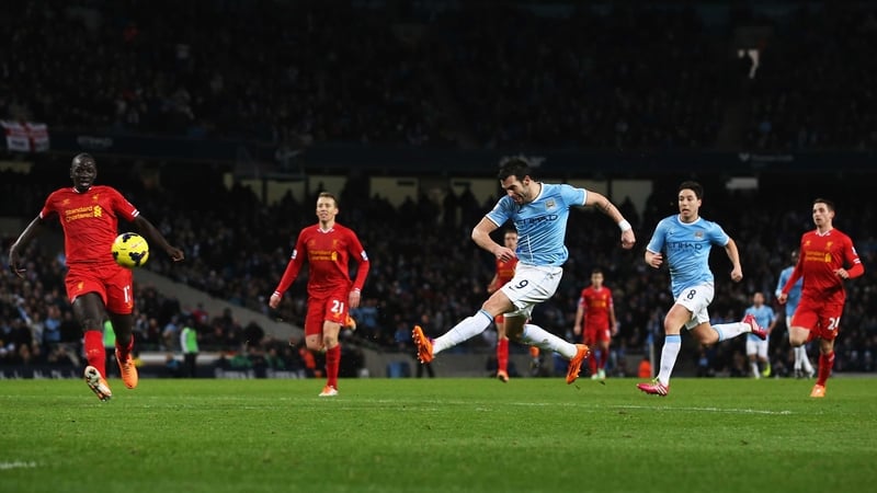 Alvaro Negredo of Manchester City shoots to score what proved to be the winner