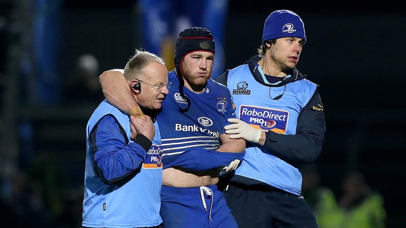 Sean O'Brien is helped from the field at the RDS