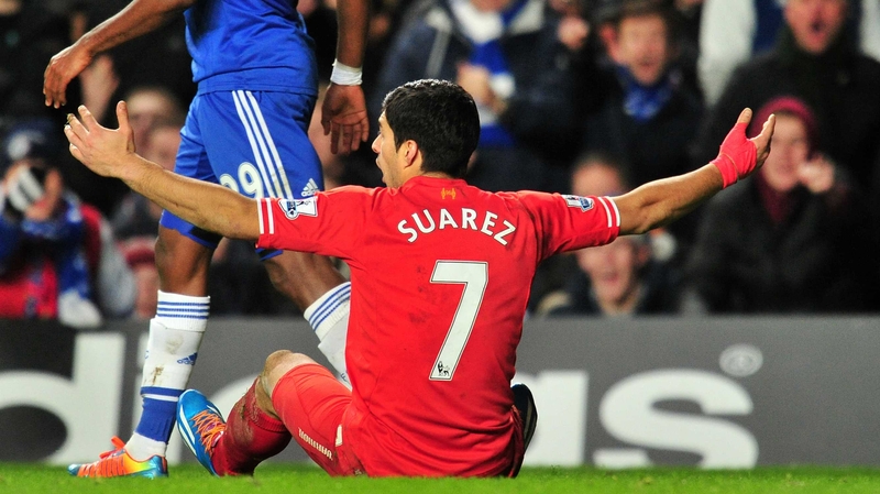 Luis Suarez appeals to the referee during Liverpool's clash against Chelsea