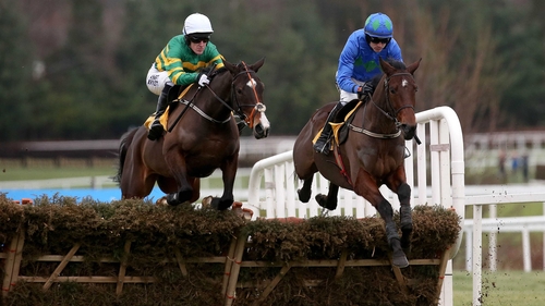 Hurricane Fly jumps the last to lead Jezki in the Ryanair Hurdle at Leopardstown last year