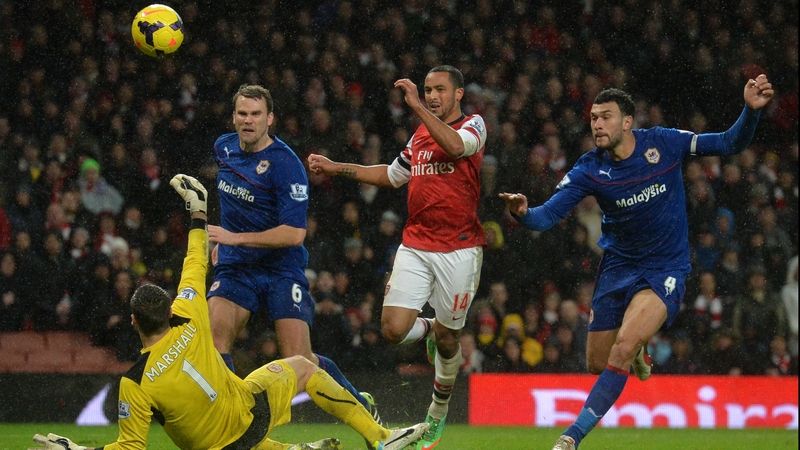 Theo Walcott beats Cardiff keeper David Marshall for Arsenal's second goal