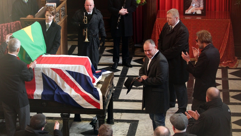 Biggs' son Michael receives his hat