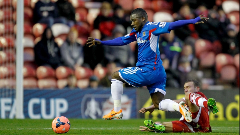 Ben Gibson of Middlesbrough challenges Hull's Aaron McLean