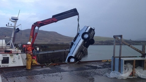 A car is lifted from the water at Cleggan Pier (Pic: Shane Bisgood)