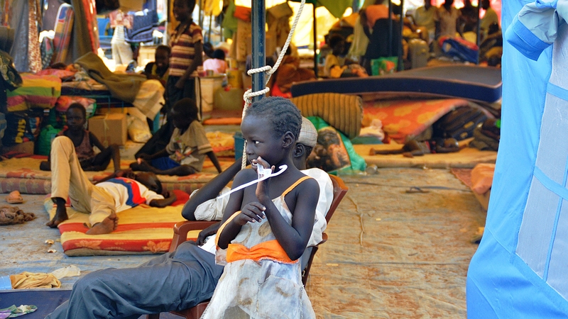 A South Sudanese child stands at an encampment within the United Nations Mission in South Sudan