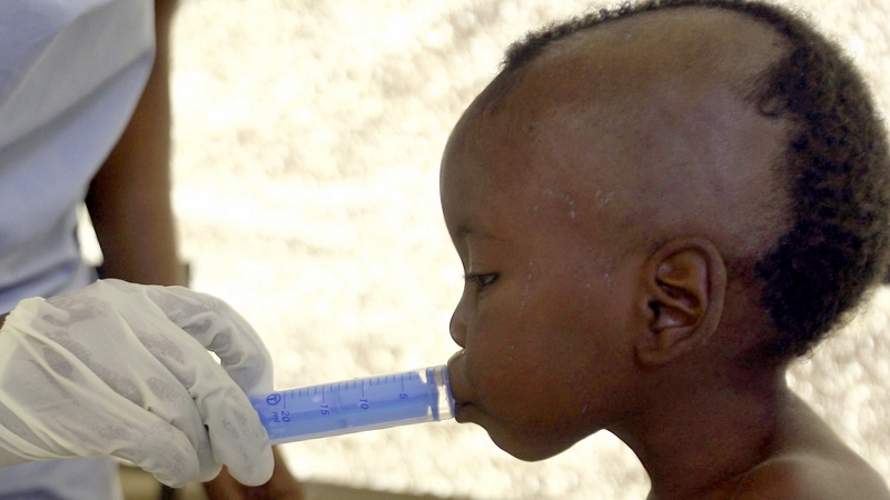 A small child, sick with cholera, is given medicine at at the Cholera Treatment Center of Doctors Without Borders in Tabarre, Haiti in 2010