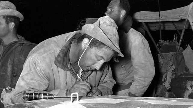 Mr Sharon writes a note on the hood of a jeep before the attack on the Mitla Pass during Operation Kadesh in 1956