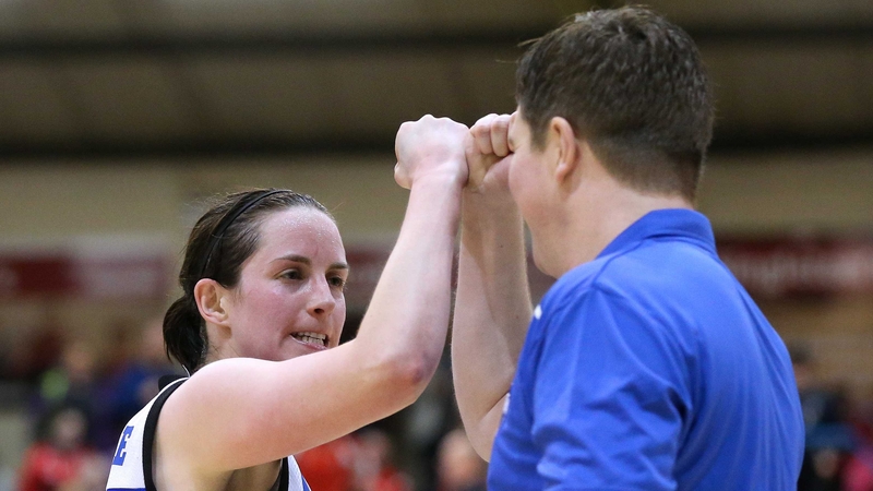 Niamh Dwyer celebrates with coach Paul Kelleher