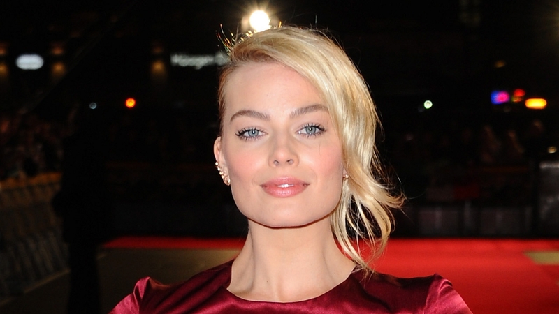Margot Robbie happy to strip for movie role
