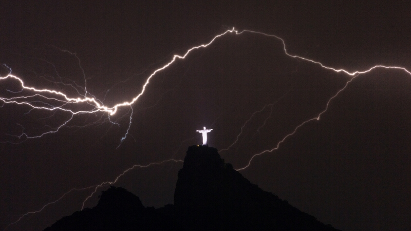 Lightning flashes over the Christ the Redeemer statue in Brazil