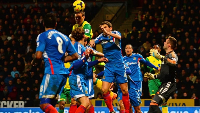 Ryan Bennett jumps above the Hull defence to score