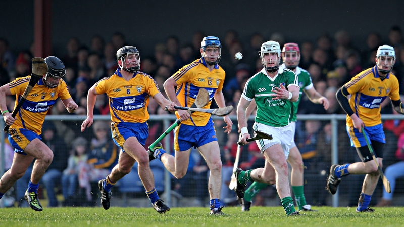 Limerick's Cathal McNamara is pursued by Clare's Nicky O'Connell, Liam Markham, Bobby Duggan and Conor Cleary