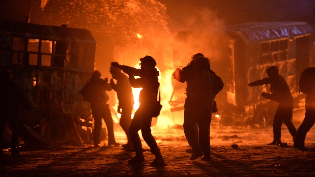 Many of the protesters wore gas masks to protect them from tear gas fired by police