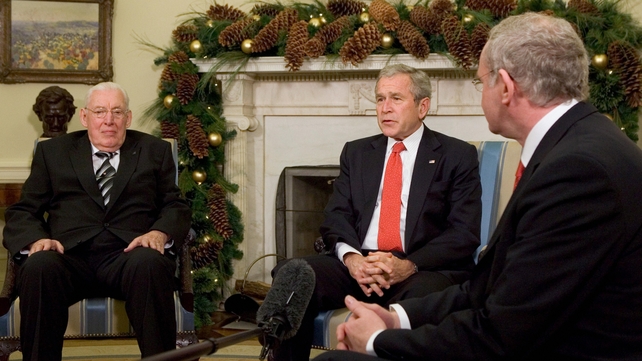 US President George W Bush speaks with Mr Paisley and Mr McGuinness in 2007