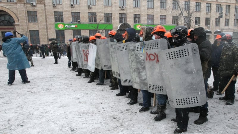 Protesters protected themselves with shields (Pic: EPA)