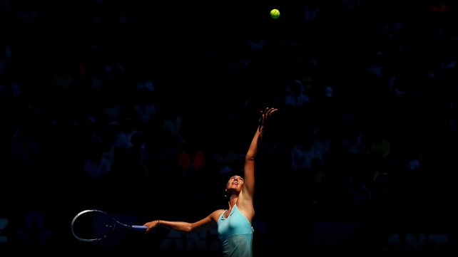 Maria Sharapova serves in her match against Karin Knapp during the Australian Open at Melbourne Park