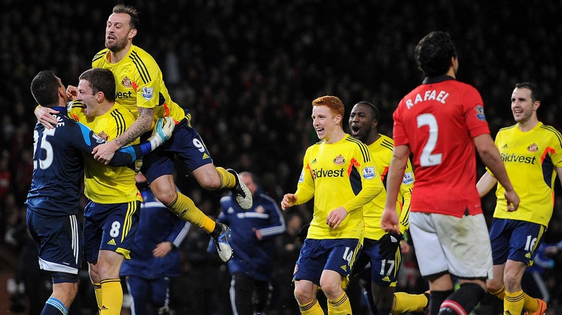 John O'Shea (r) celebrated with his team-mates after Sunderland won the penalty shootout 2-1