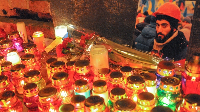 Candles at a shrine in memory of Sergey Nigoyan reportedly shot dead during protests (Pic: EPA)