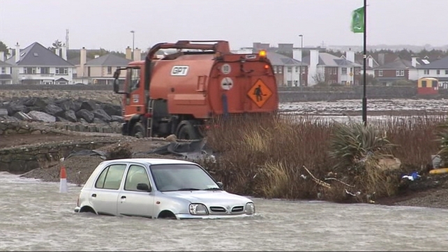 A car left stranded in flood water