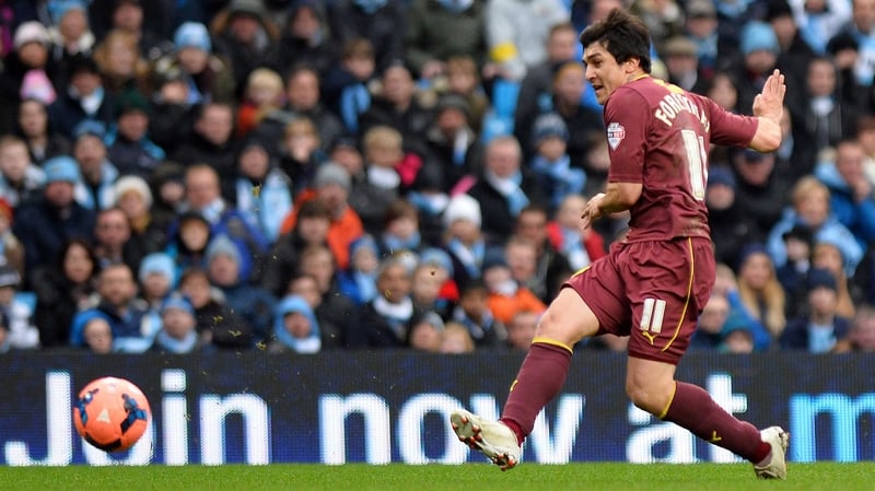 Watford's Fernando Forestieri shoots to open the scoring