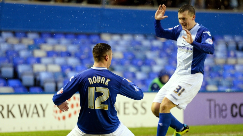 Lee Novak of Birmingham celebrates with teammate Paul Caddis after scoring the opening goal