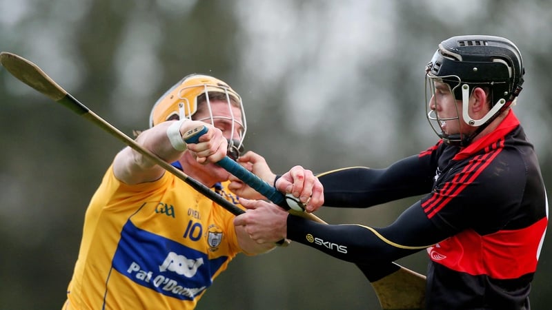 John Conlon challenging UCC's Diarmuid Lestor