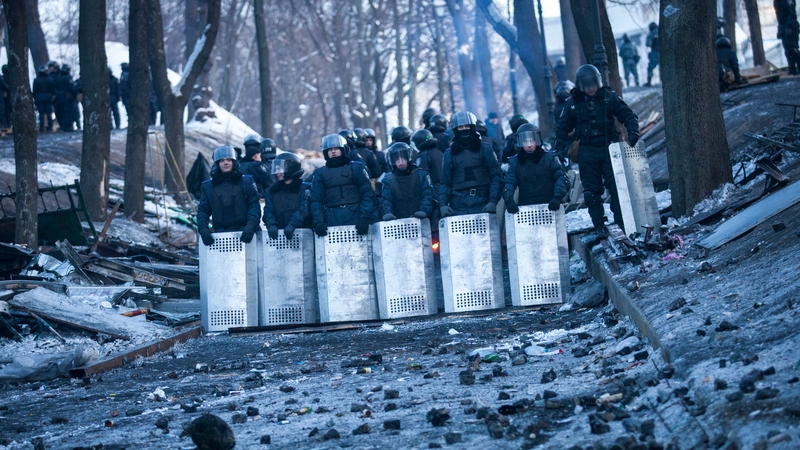 Ukrainian policemen block Grushevskogo Street in Kiev