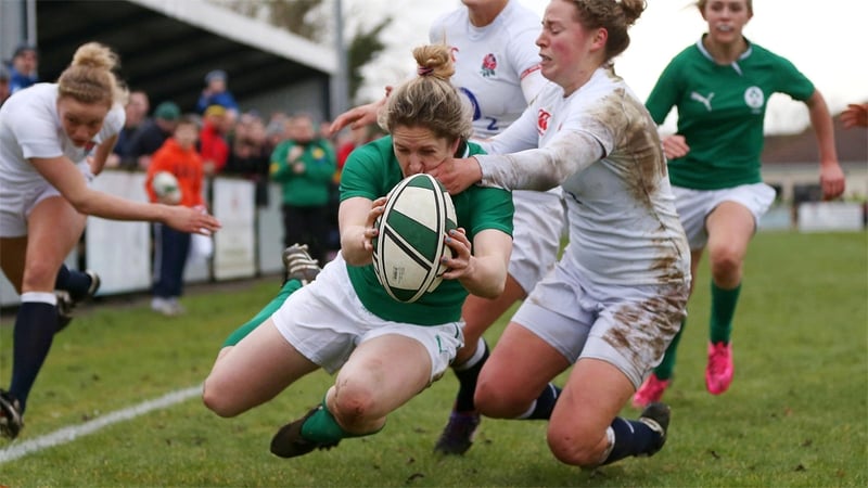 Ireland wing Alison Miller scores one of her three tries against England last year