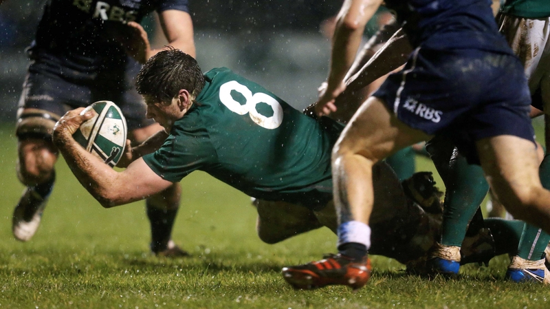 Ireland’s Jack O’Donoghue scores the opening try