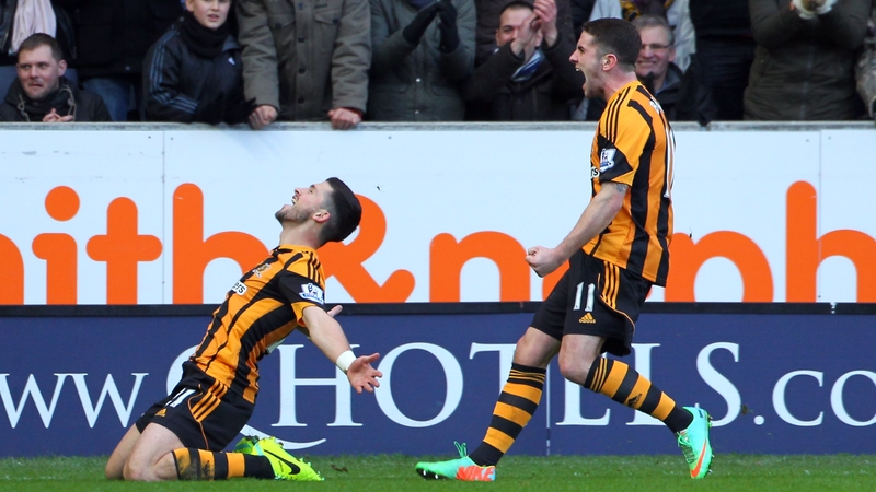 Shane Long celebrates his debut goal for Hull with team-mate Robbie Brady