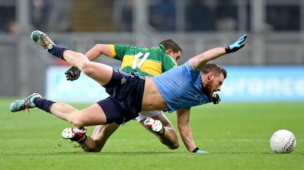 Dublin's Philip McMahon with Michael Geanry of Kerry dive for the ball at Croke Park