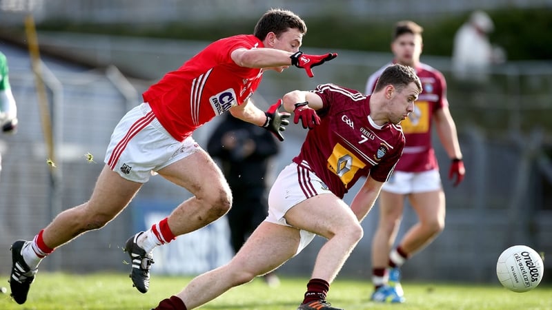 Cork's Mark Collins and Jamie Gonoud of Westmeath do battle for the ball