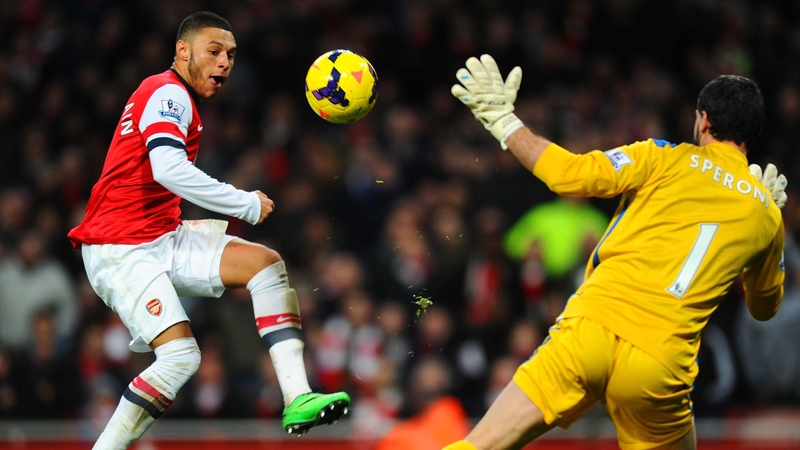 Alex Oxlade-Chamberlain scores the opening goal for Arsenal