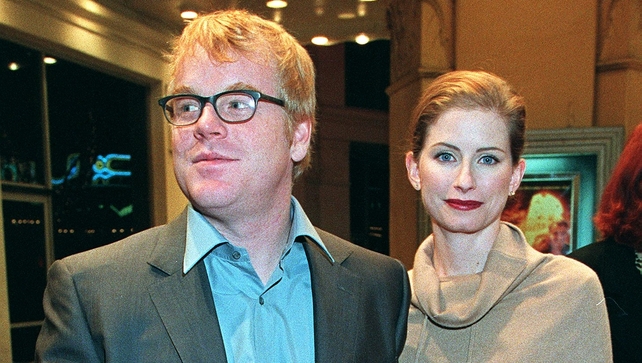 The actor arriving at the premiere of The Talented Mr Ripley with his former wife Jaysa