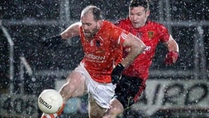Armagh's Ciaran McKeever in action with Down's Donal O'Hare