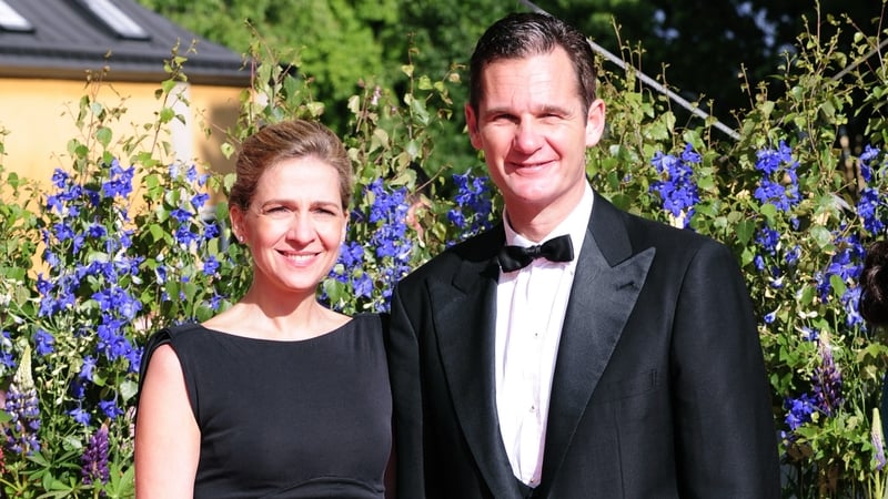 Infanta Christina (L) of Spain and husband Inaki Urdangarin (R) arrive in front of the Eric Ericson Hall of Skeppsholmen in Stockholm
