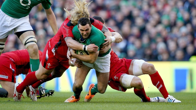 Dave Kearney drives on the Irish challenge in the first half