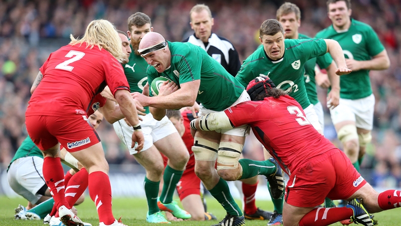 Paul O'Connell is tackled by Adam Jones