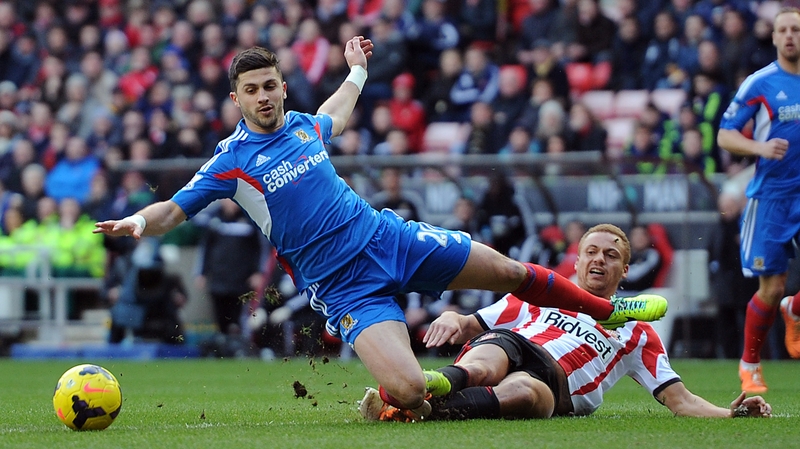 Wes Brown of Sunderland was red-carded for chopping down Hull's Shane Long
