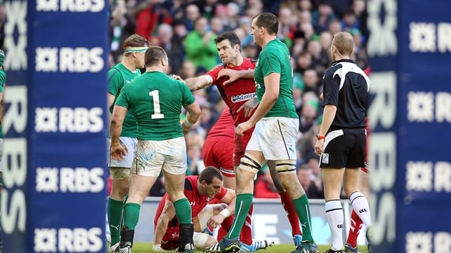Mike Phillips gets involved in some pushing and shoving after Ireland's second try