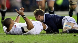England's Luther Burrell celebrates England's opening try