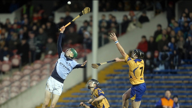 Cathal King of Na Piarsaigh with Gareth Heagney and Eoin Lynch of Portumna during the All-Ireland club hurling semi-final