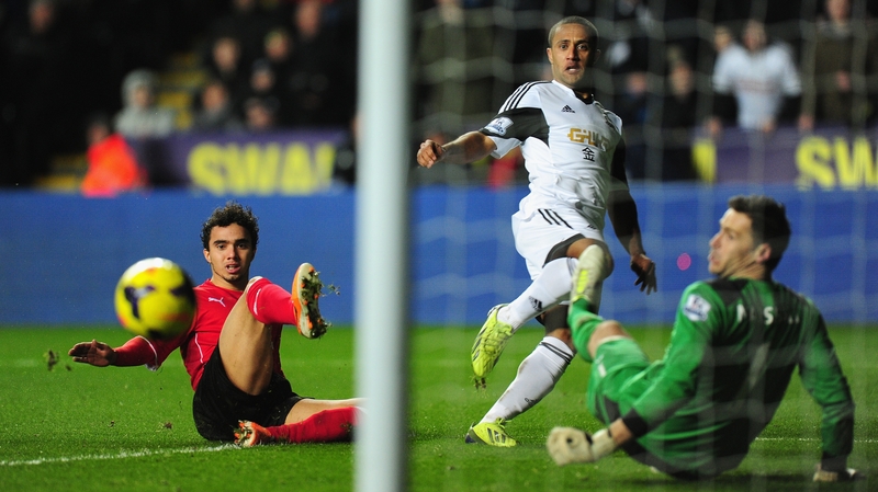 Wayne Routledge opens the scoring for Swansea