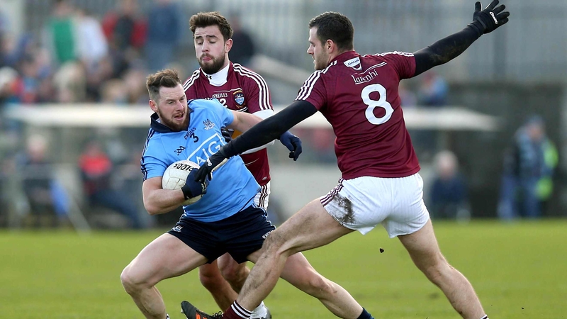 Philly McMahon of Dublin with Paul Sharry and David Duffy of Westmeath