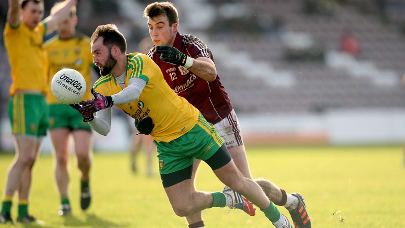 Galway's Paul Conroy and Karl Lacy of Donegal in action in Salthill