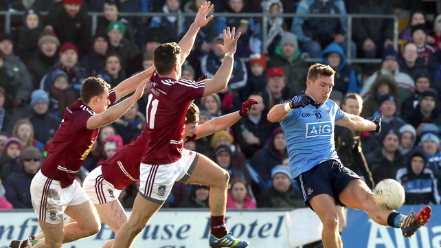 Paul Flynn under pressure from a posse of Westmeath defenders